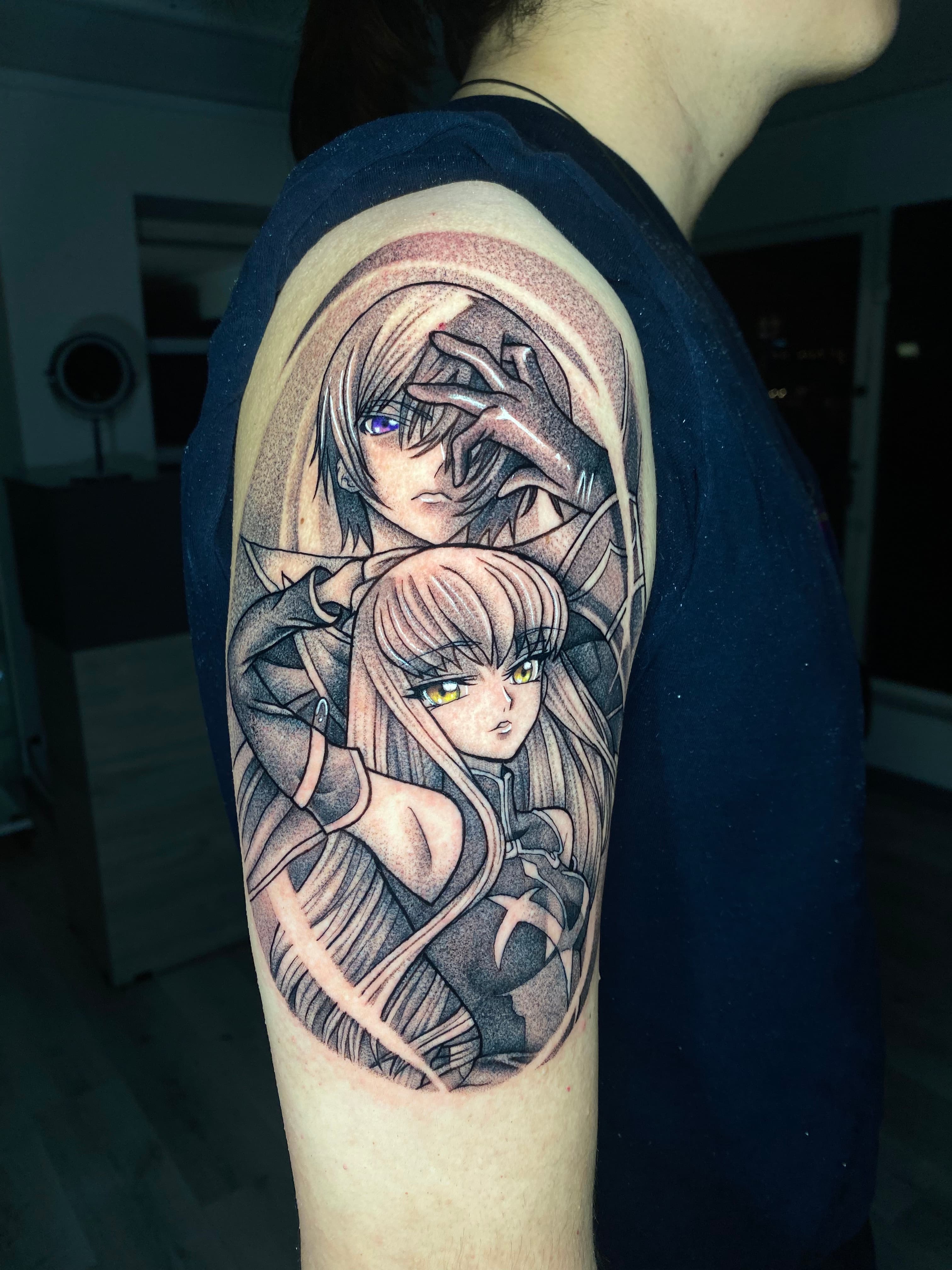 Anime style arm tattoo for men