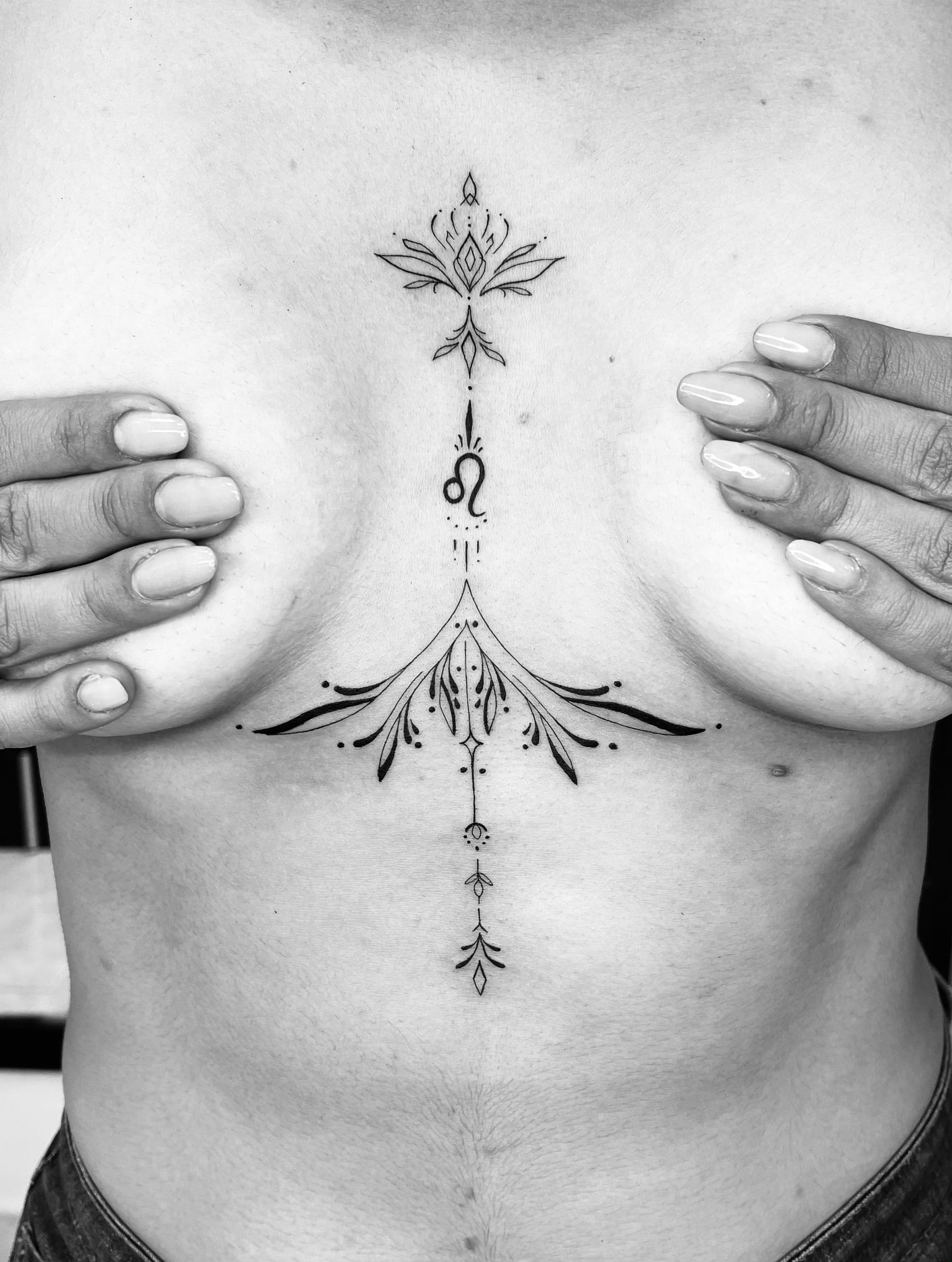 Sternum Leo tattoo