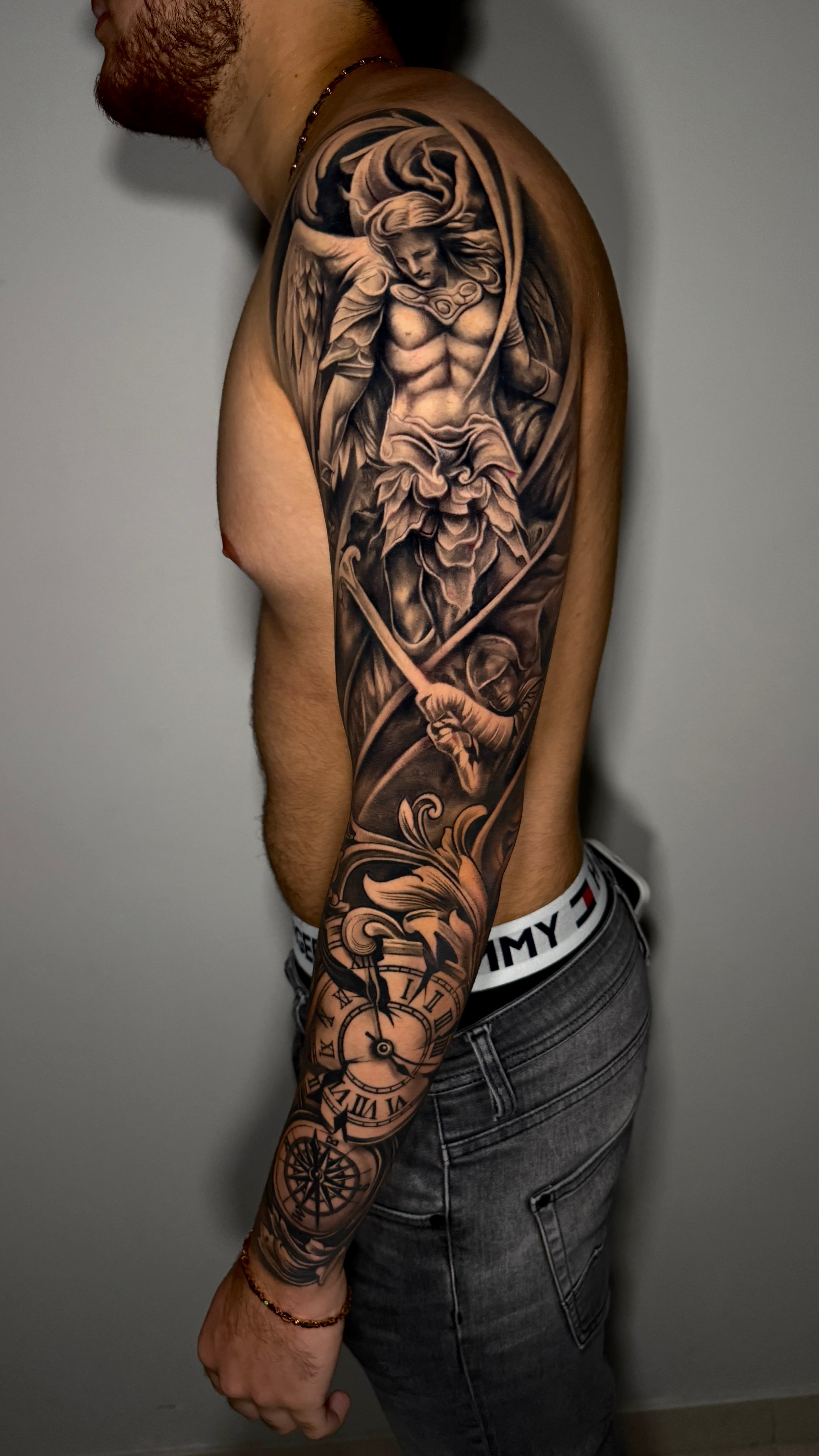 Full sleeve male tattoo