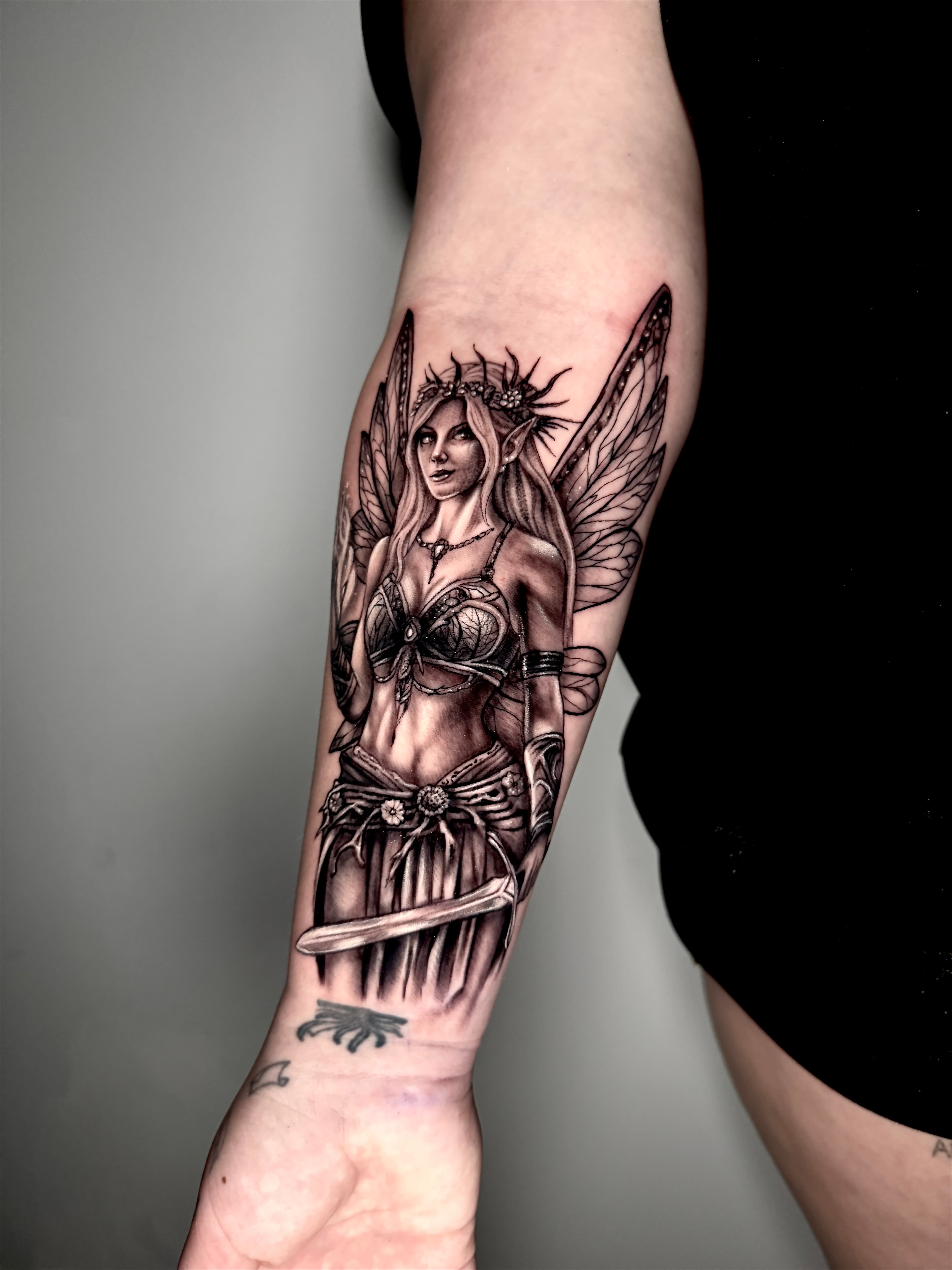 Partial surreal sleeve tattoo for men