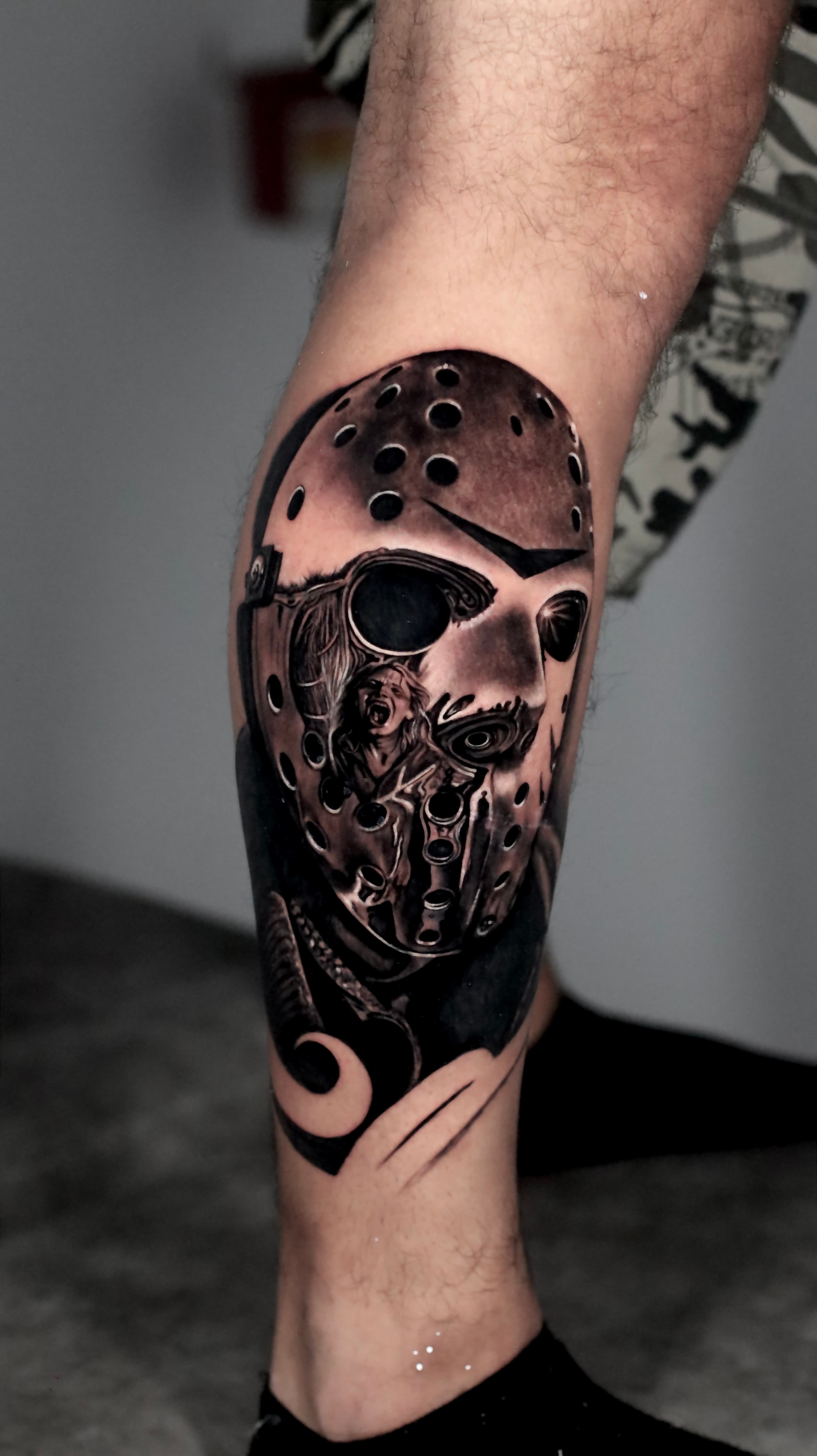 Jason Voorhees hockey mask black grey leg tattoo