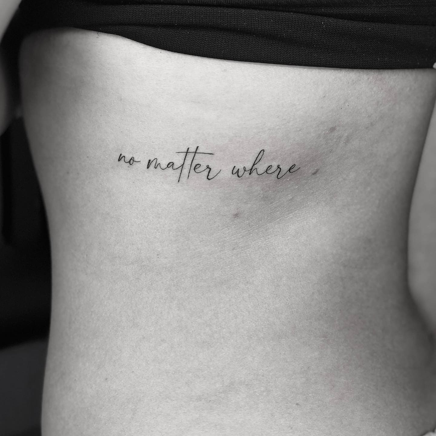 Rib phrase tattoo