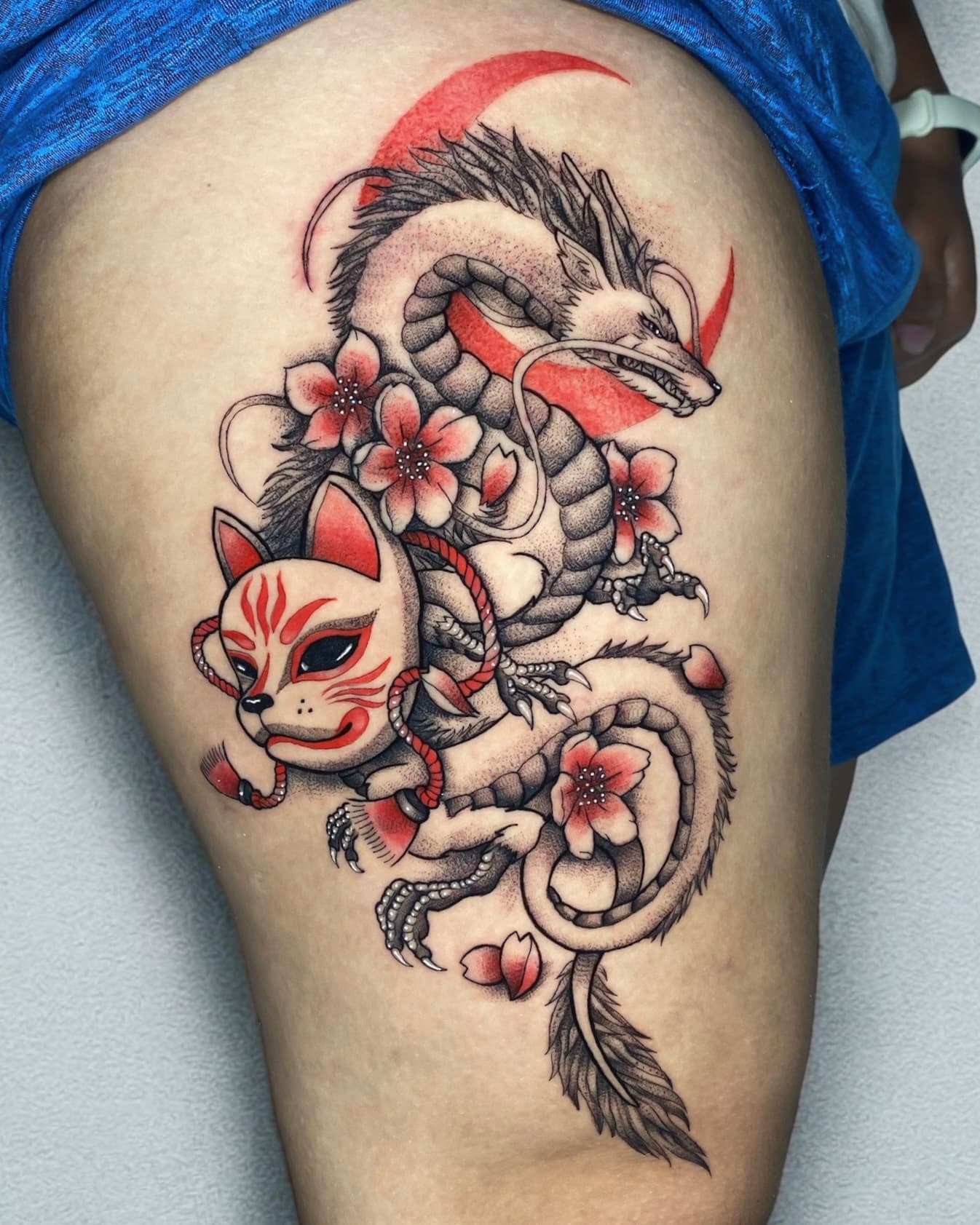 Anime thigh tattoo