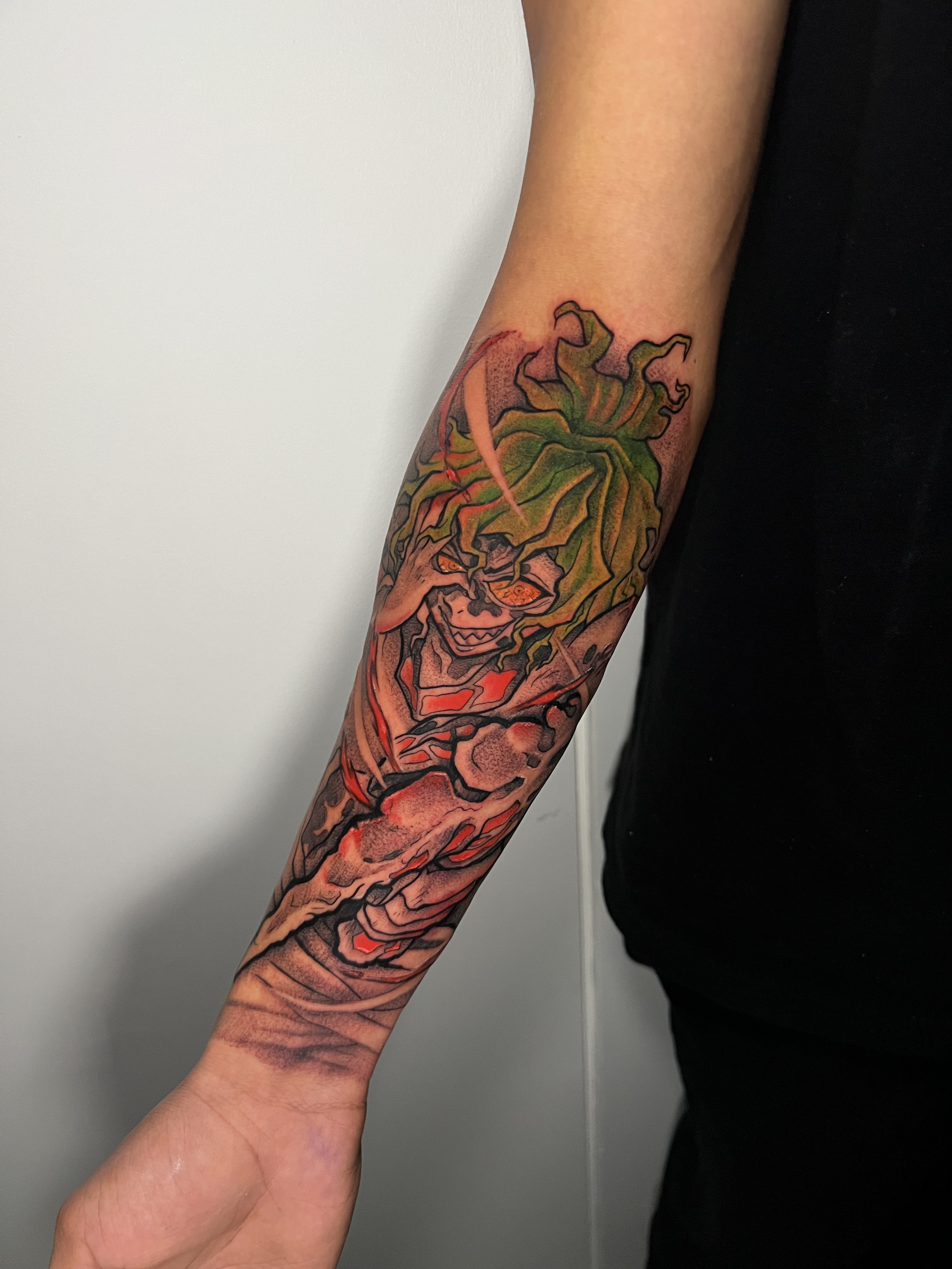 Anime arm tattoo