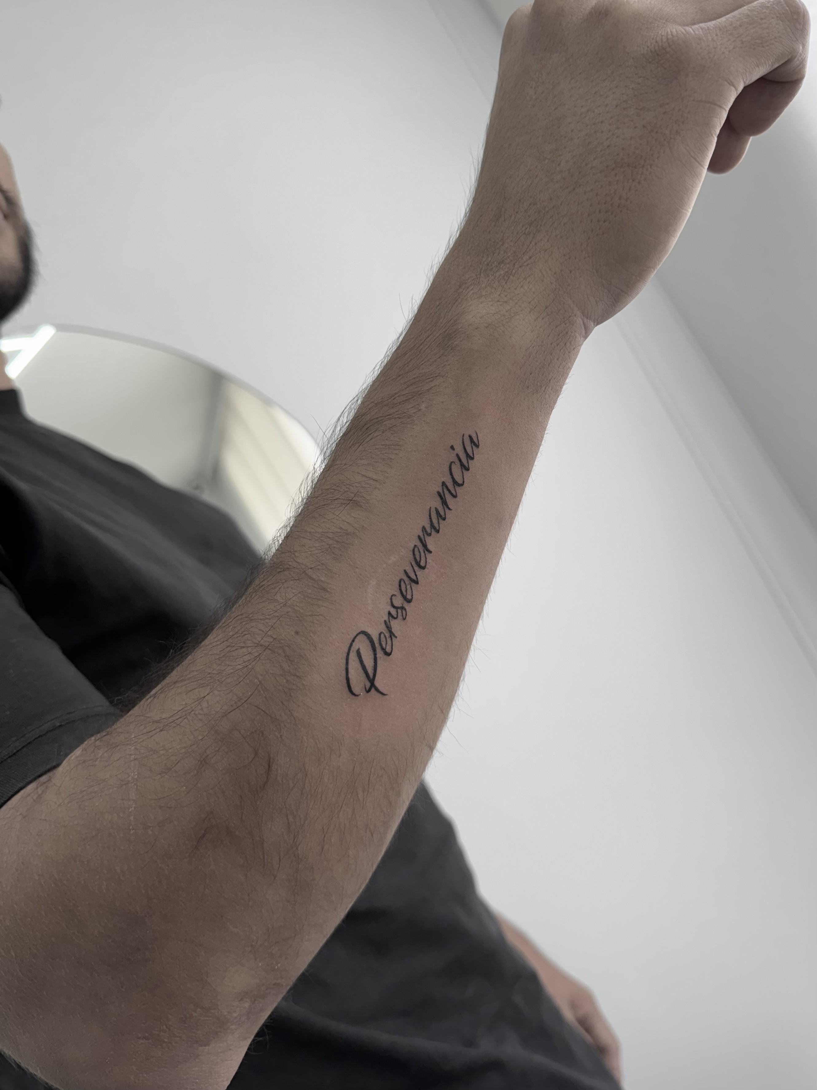 Delicate upper wrist tattoo